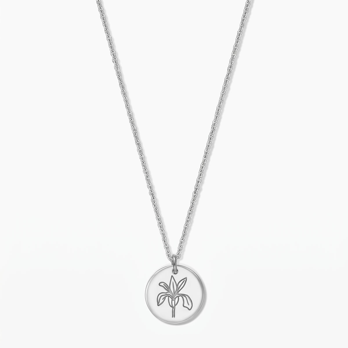 Elegante collana in argento sterling con pendente rotondo con motivo di iris in line-art su sfondo bianco.