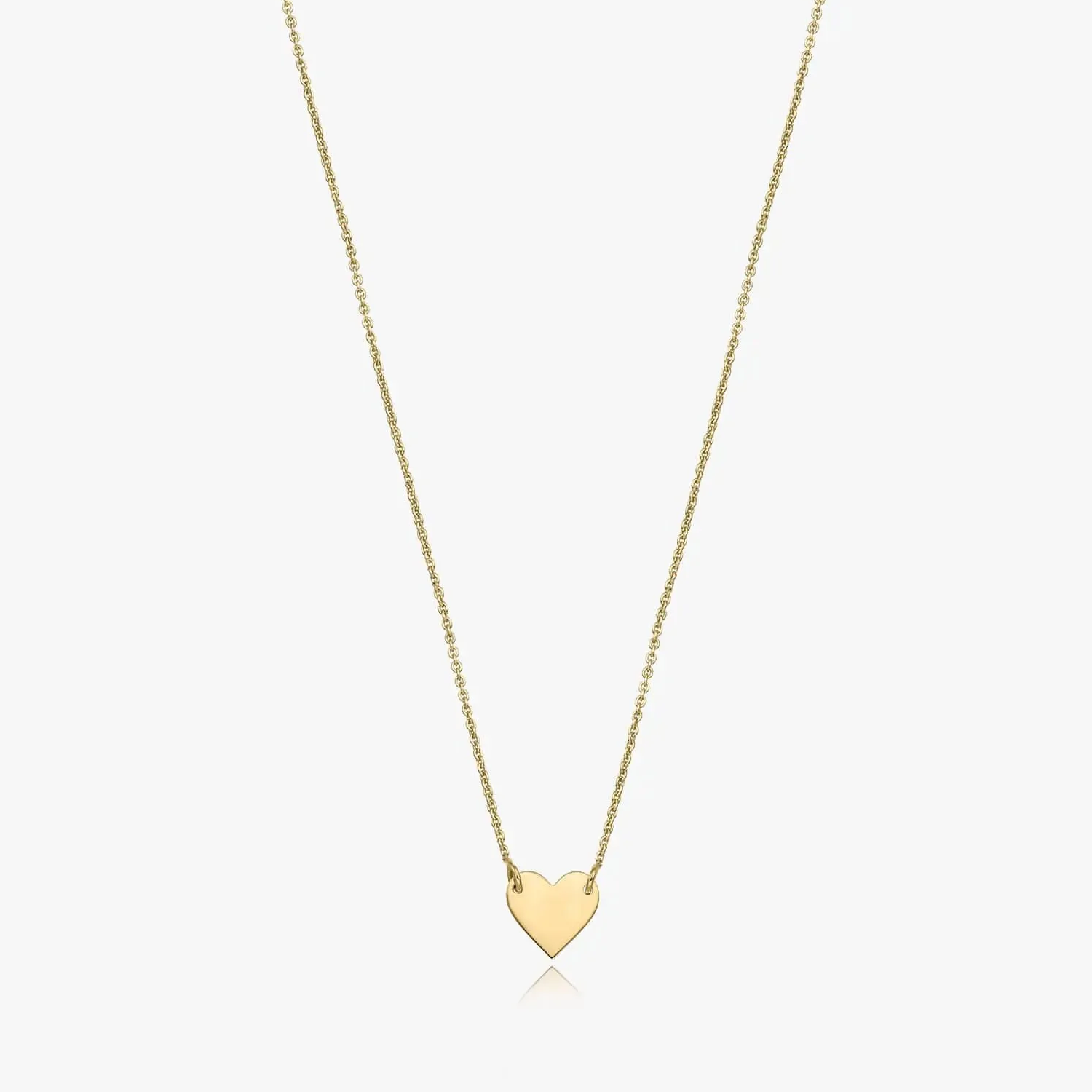 Collana in oro 14K con ciondolo a forma di cuore su sfondo bianco.