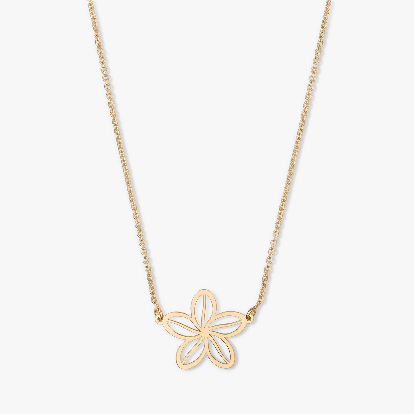 Collana d'oro con pendente a forma di fiore su sfondo bianco.