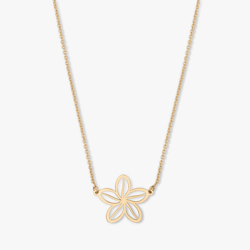 Collana d'oro con pendente a forma di fiore su sfondo bianco.