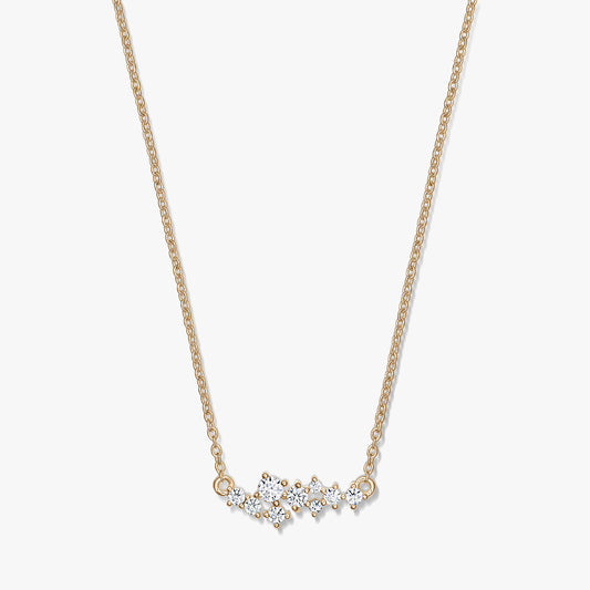 Collana in argento Golden Constellation con catena delicata e motivo a costellazione di pietre trasparenti, fotografata su sfondo bianco.