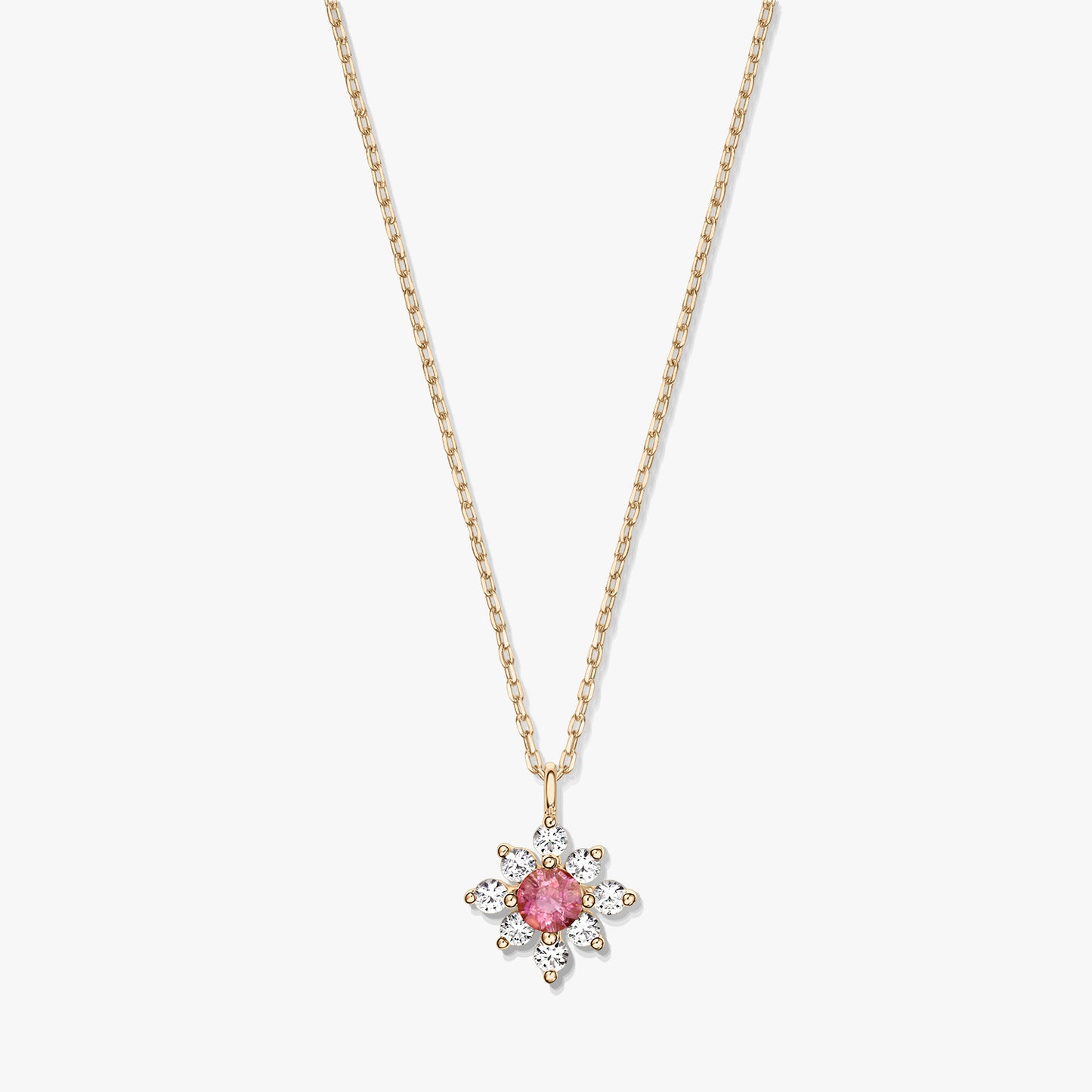Elegante collana in oro 14K con pendente a fiore con tormalina rosa centrale circondata da zaffiri bianchi su sfondo bianco.