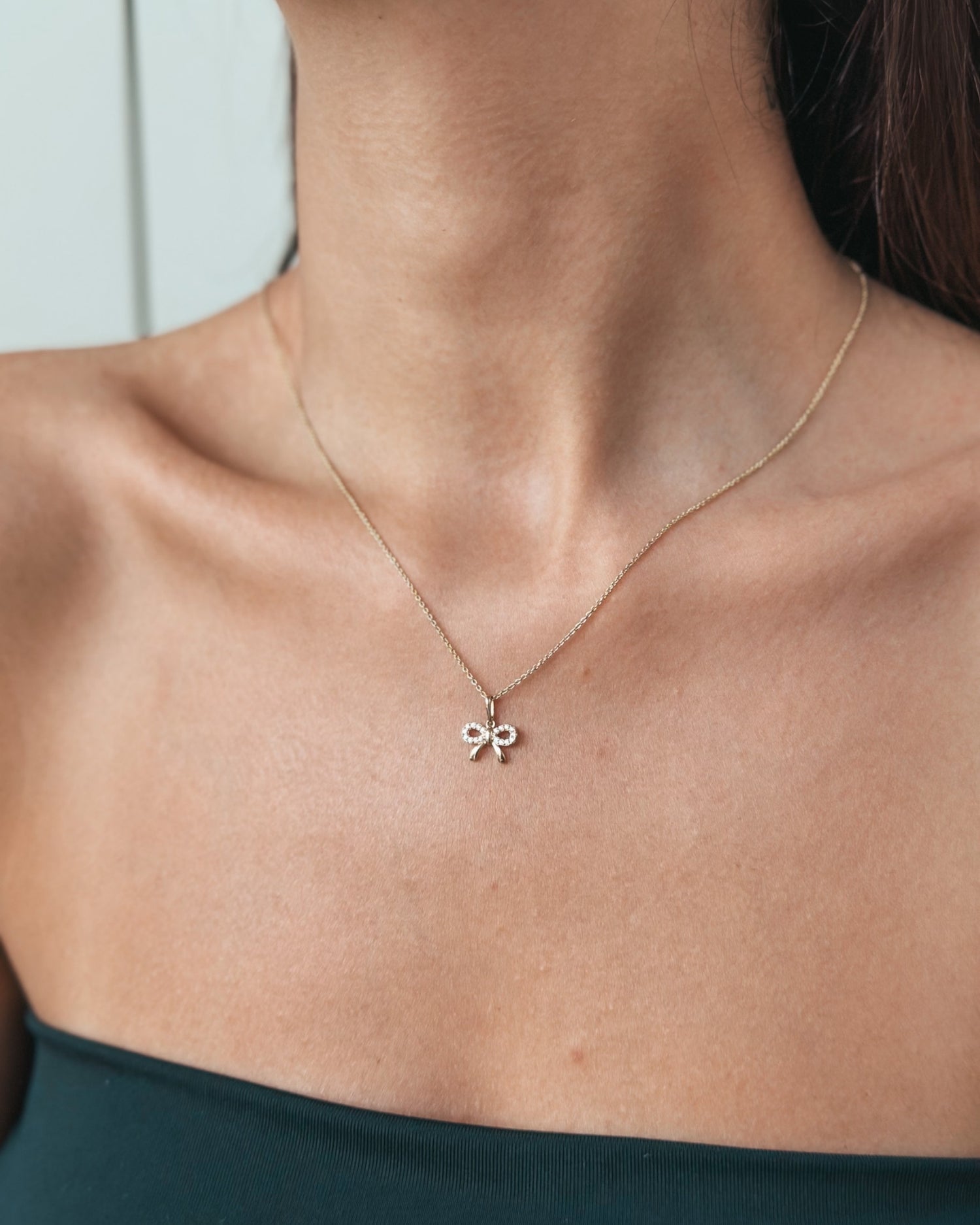 Ciondolo in oro giallo Bow Charm - Indira