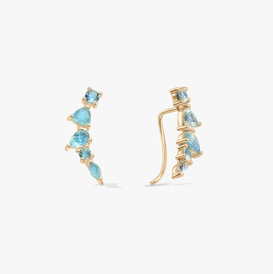 Coppia di orecchini ear climber in argento sterling placcato oro con pietre di labradorite blu, mostrati in vista frontale e laterale su sfondo bianco.