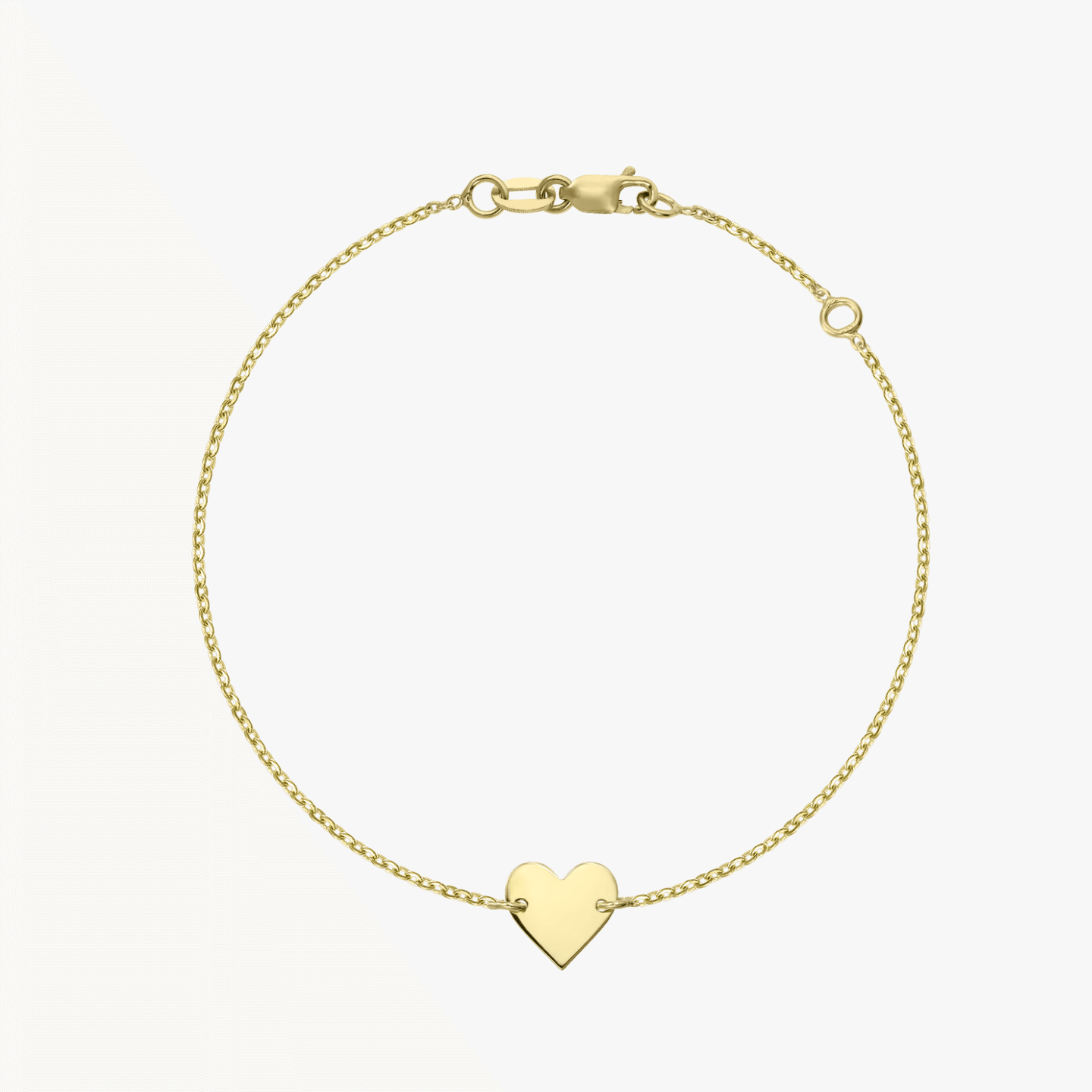 Bracciale a cuore in oro 14K su sfondo bianco
