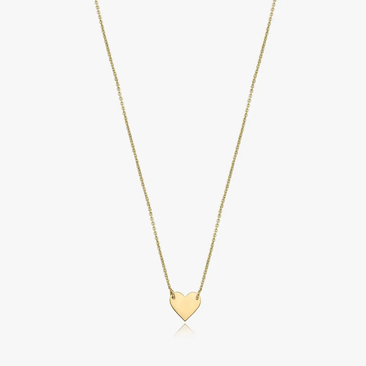 Collana in oro 14K con ciondolo a forma di cuore su sfondo bianco.
